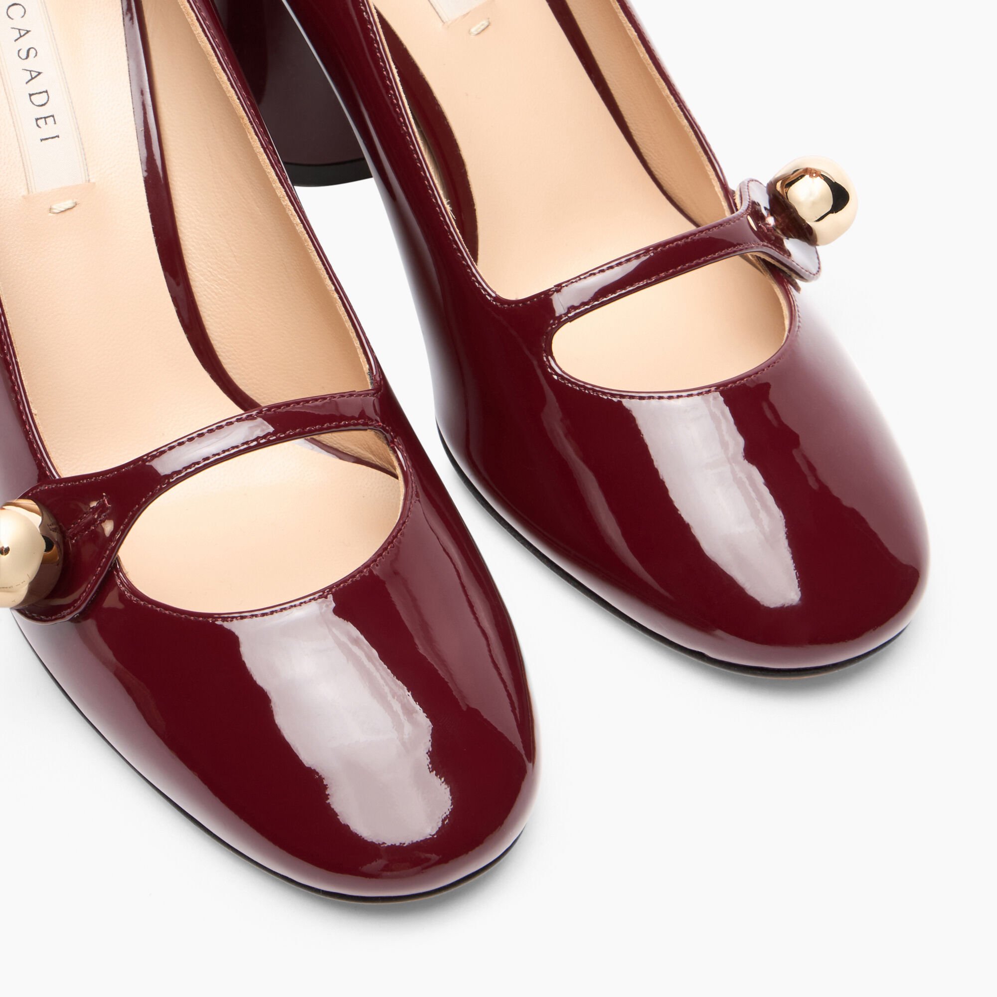 Casadei Cleo Patent Leather Pumps حليبي 1F971Y0801TIFFA